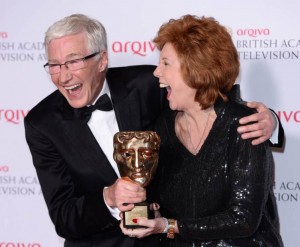 LONDON, ENGLAND - MAY 18:  Cilla Black gets presented with the Special Award by Paul O'Grady, at the Arqiva British Academy Television Awards held at the Theatre Royal on May 18, 2014 in London, England.  (Photo by Karwai Tang/WireImage)