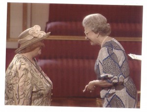 Miss Nancy Martin receives her MBE from the Queen