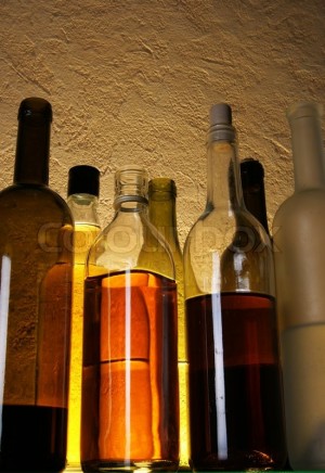 2293446-still-life-with-alcoholic-drinks-over-yellow-background