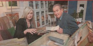 Marie Claire Douglas and Denis Tuohy look through the artefacts belonging to the Newry First World War nurse that are the focus of a play being staged at the Ulster Museum in Belfast. Pic. from Irish News Mal McCann