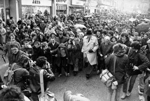Rev. Ian Paisley, with two thousand Loyalists walks in a snow flurry down Belfast's Royal Avenue during the Protestant Day of Action in Northern Ireland, Nov. 23, 1981. (AP Photo/Peter Kemp)
