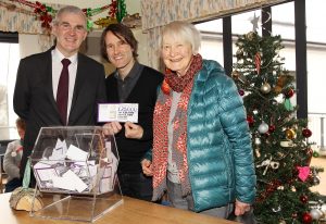 Tim Wheeler took some time out from his time at home to make the draw for the DRP 25th year £25000 draw at their Downpatrick head quarters The draw was overseen by Brian Connor from thr Danske Bank and MrsWheeler . Pic Philip Walsh